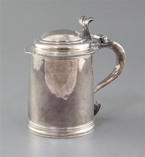 A Queen Anne Britannia standard silver lidded tankard, by Seth Lofthouse? 16.5 oz.